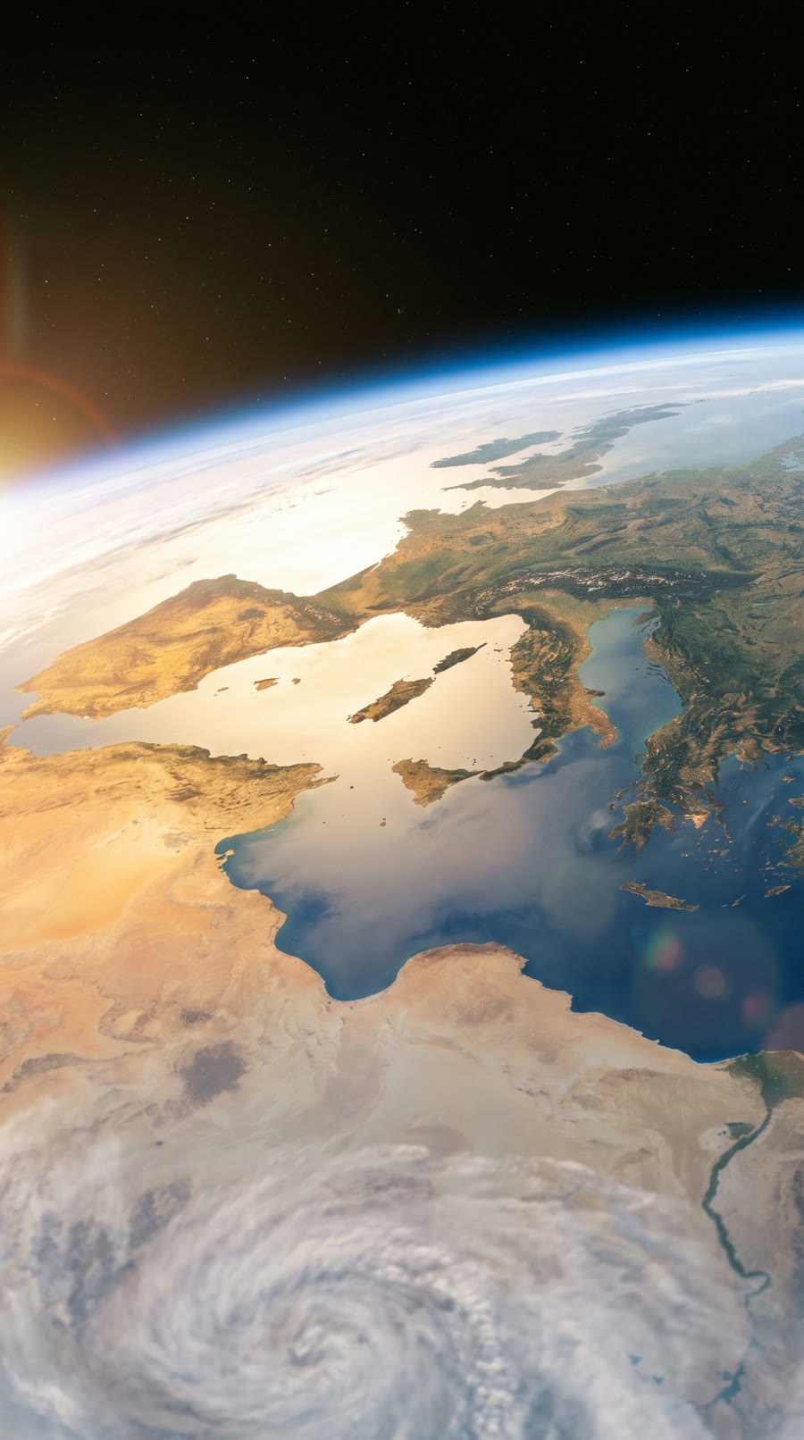An Earth zoom from space through the clouds down to the coastline and the villa on its cliff.
